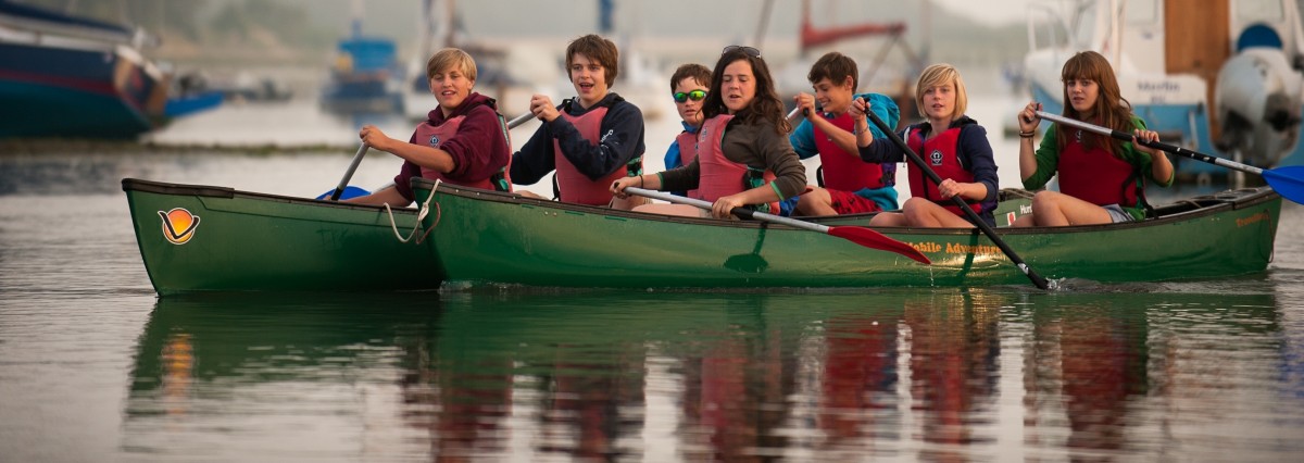 Children canoeing at Chichester Harbour, West Sussex