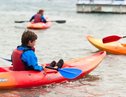 Children Kayaking across beautiful Chichester Harbour